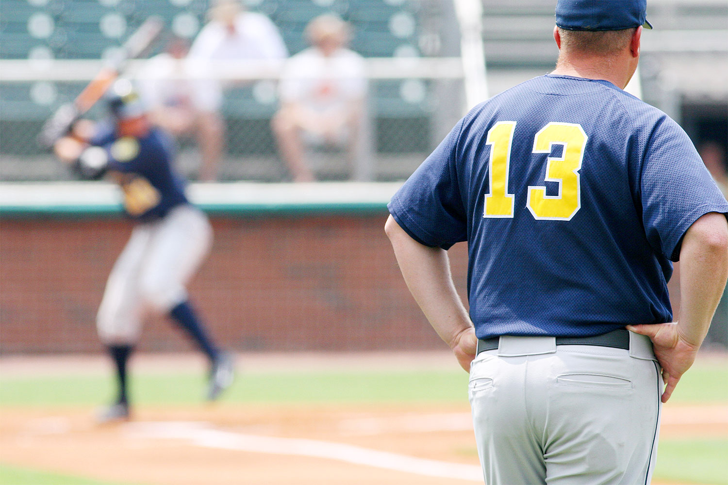 Why do baseball managers wear uniforms?